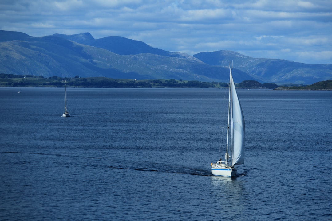 a sailboat in the middle of a large body of water